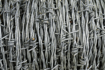 Close up of barbed wire, full frame background