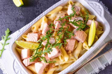 Salmon with penne noodle and arugula