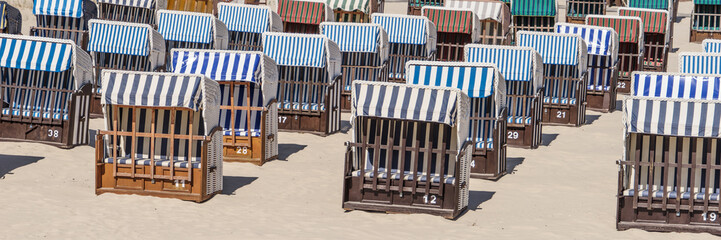 Many beach chairs on a sunny day at the Baltic Sea