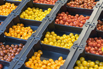 Boxes with tomatoes on the market
