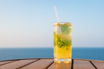 Fresh mint and fruit cocktail drink.