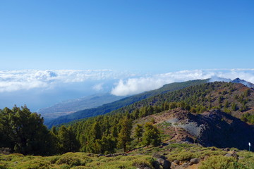 Fototapeta na wymiar Hiking trail GR131 Rute de los Volcanes leading on the edge of Caldera de Taburiente which is the largest erosion crater in the world, La Palma, Canary Islands, Spain