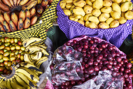 Close-up of fruits in baskets at fruit market