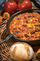 Chili con carne in a clay pan.