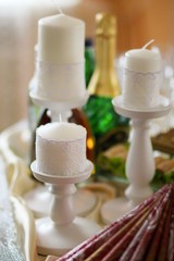 Candles as decoration on wedding or festive table.