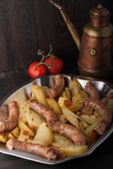 sausage and potatoes - Italian cuisine