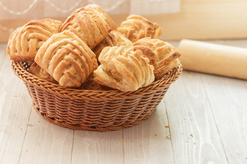 Cookies and sweet pastries with cross wired lines in basket