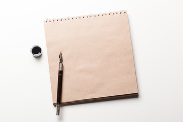 Old fountain pen on aged paper