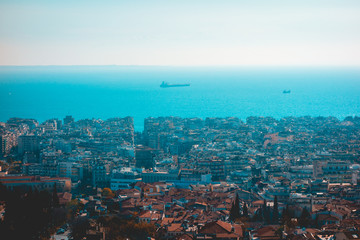overview about thessaloniki with sea and some container ships in the background