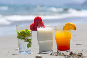 Three kinds of refreshing cocktails at sea in sunny day