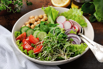 A beautiful Mediterranean salad of delicate leaves of lettuce and spinach, with the addition of Nuta, slices of fresh radish, tomato, cucumber and microsegment of radish. 