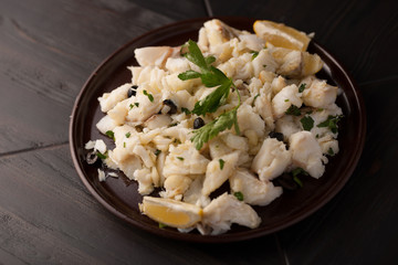 cod with salad - Italian cuisine