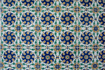 The texture of the old ceramic tile with oriental ornament. Abstract background for design.