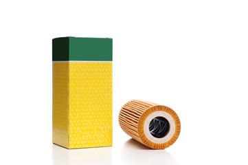 Oil change. Oil filter on white background