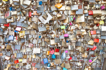 Love locks hang representing secure friendship and romance
