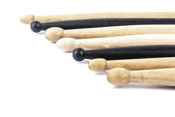 many drum sticks of two colors isolate
