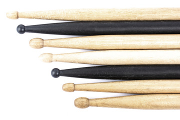 many drum sticks of two colors isolate