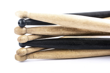 many drum sticks of two colors isolate