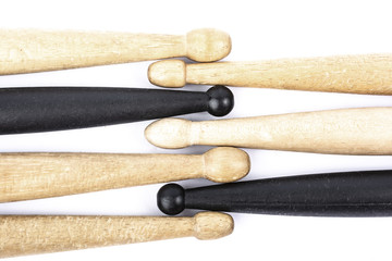 many drum sticks of two colors isolate