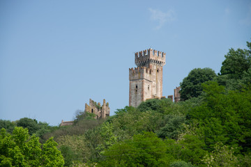 Fototapeta na wymiar Medieval towers of the Scaliger castle seen from Borghetto sul mincio