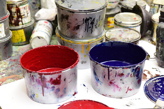 Ink cans in a printing press