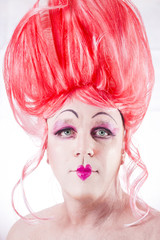 Man in drag with pink wig and lipstick Fluid Self