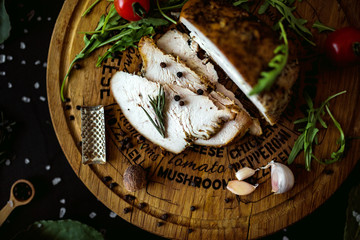 Grilled beef steak medium rare on wooden cutting board