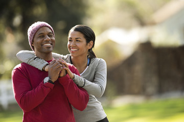 Friends meeting up for a jog in the park.