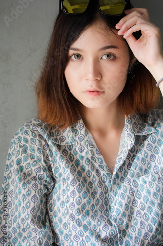 Portrait Of Thai Adult Beautiful Girl Short Hair Relax And Smile