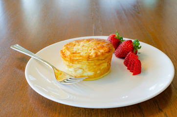 Plated breakfast quiche with strawberries