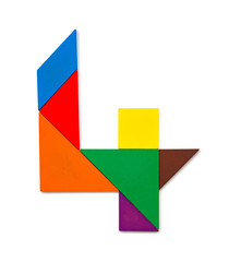wooden tangram shaped like a number 4 on white