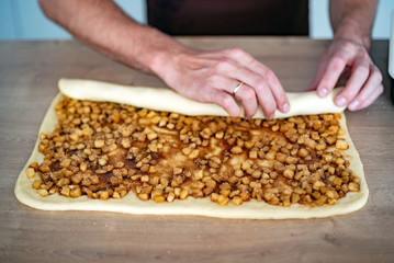 chef making cinnamons