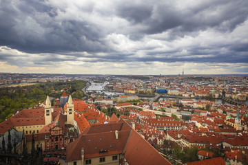 Fototapeta na wymiar View to Prague from the bell tower of St Vitus Cathedral 