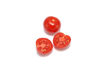 Fototapeta premium Red tomatoes on white background closeup