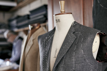 Tailormade jacket on mannequin, half finished