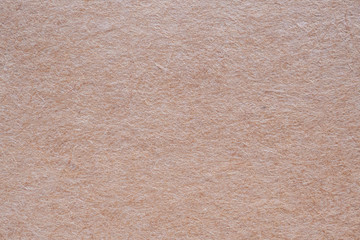 Old cardboard sheet recycle paper texture background close up