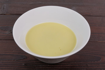 Healthy spinach soup on a table