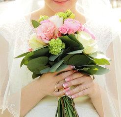 bride with wedding bouquet