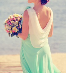 bride with wedding bouquet