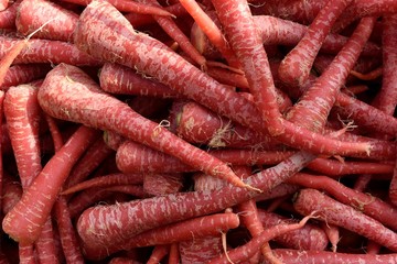 Raw red Indian carrots, farmers produce market, India