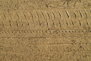 Top view of wheel tracks on sand