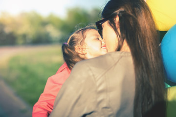 Fototapeta premium Mother's Day. Happy Mom and baby outdoor. Mother day