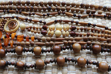 Obraz premium Wooden beads of different size and color