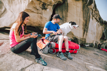 Young climbers putting climbing shoes on