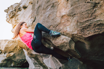 Young rock climber woman climbing the rock wall © asife