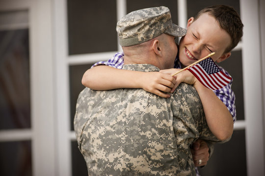 Father and son embracing each other