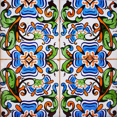 Detail of the traditional tiles from facade of old house. Decorative tiles.Valencian traditional tiles. Floral ornament
