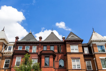 Row houses in the Washington DC neighborhood of Bloomingdale on a summer day.