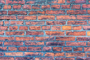 An old brick wall, suitable for textures and backgrounds.