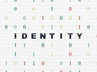 Privacy concept: Painted black text Identity on White Brick wall background with Binary Code